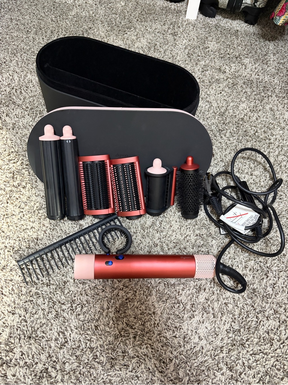 Dyson multi-styler set in pink and metallic red